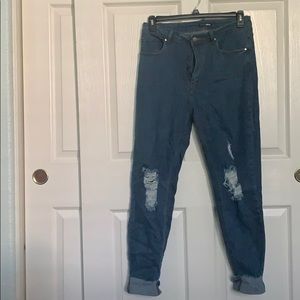 Dark blue distressed stretch denim
